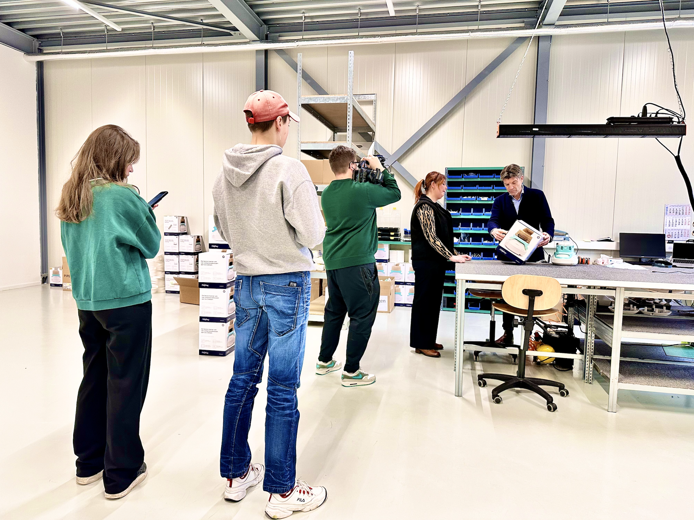Reinoud legt de markt rond kousen en hulpmiddleen uit.